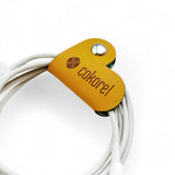 PORTA CABLES CORAZÓN MOSTAZA
