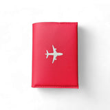 KIT PORTA PASAPORTES HOMBRE NEGRO + ROJO
